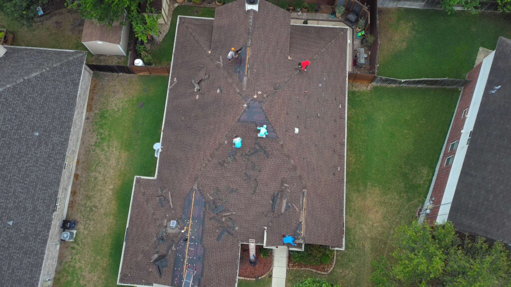  Overhead view of a Zooby roofing project showing roof edges, gutters, trim lines, and exterior details.