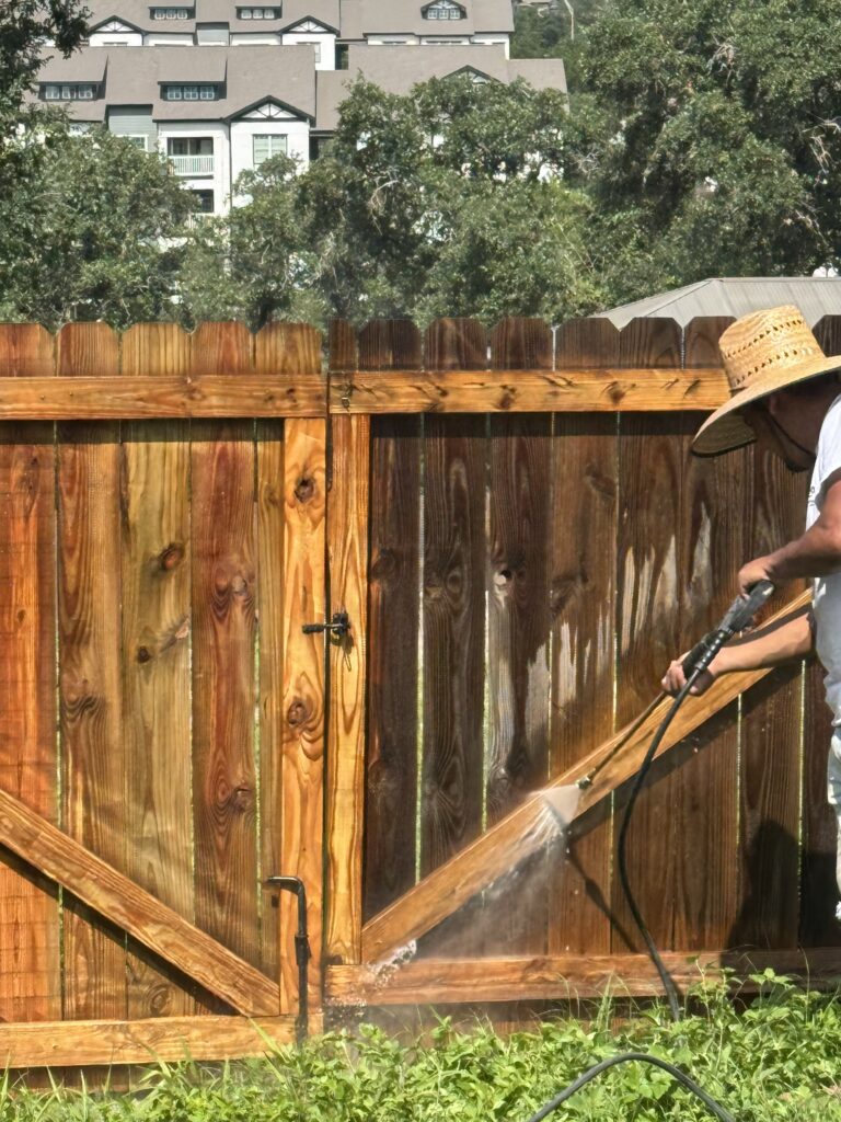 Before and after wood fence cleaning by Zooby in San Antonio