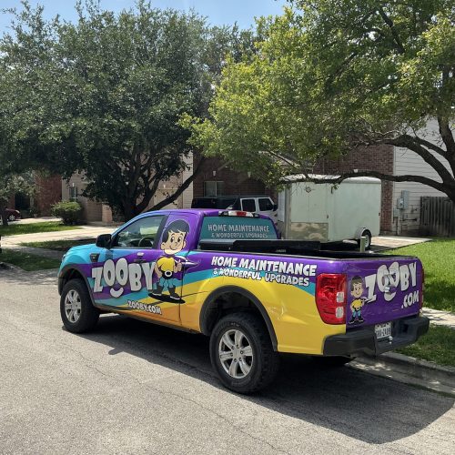 Reliable Home Maintenance Services in Deerfield Branded Company Vehicle Branded home maintenance service vehicle parked in a residential Deerfield neighborhood